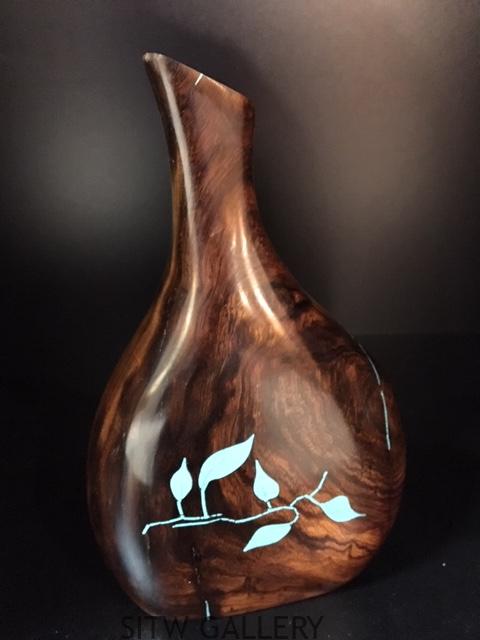 # 229 vase $250.00 front 9.5" x 6 x 2.5"