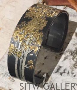 #WV044B Aspen Trees Collection II cuff: Carved & engraved argentium silver with CA placer gold fused, oxidized. Size M 1.8"h x 2.27"w x 0.87"d $